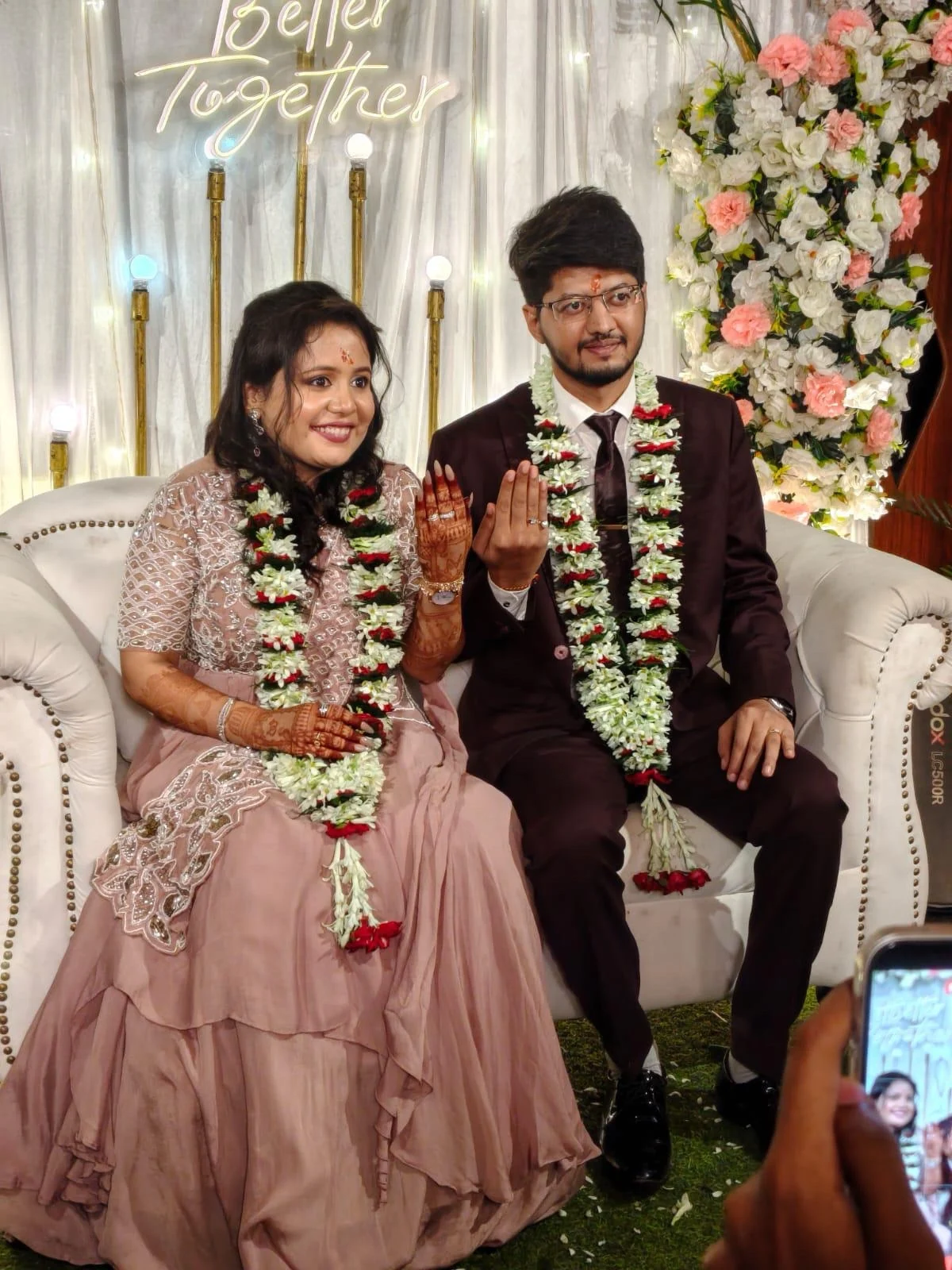 Anmol and Aishwarye showing their engagement rings
